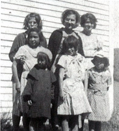 families in front of church